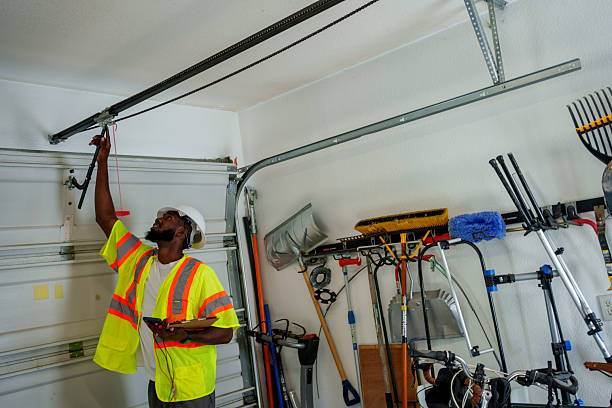 Professional Garage Door Panel Replacement technician working in Lincoln County County, ME